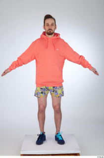 Nigel a-pose blue sneakers dressed floral printed shorts salmon hoodie…